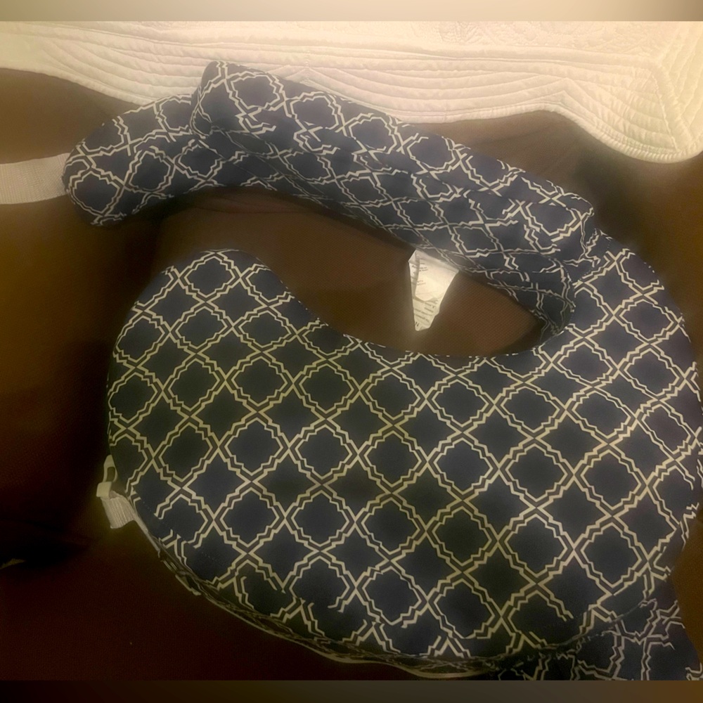 Nursing pillow with strap
